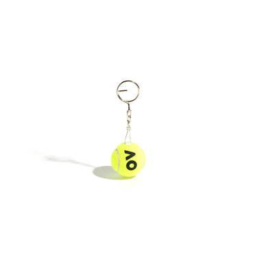 A yellow tennis ball keyring with a silver chain and split keyring, front view photo featuring the AO logo.