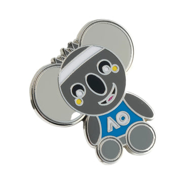 A lapel pin featuring a cartoon koala character with a white AO.