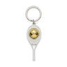 A keyring featuring a silver tennis racquet pendant with a gold spinning tennis ball inside, carrying the AO logo.