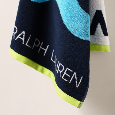 Ralph Lauren towel with colorful design on a neutral background