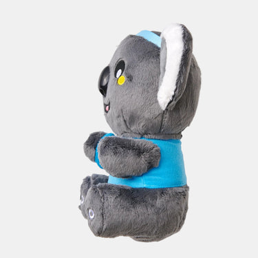 A plush toy of a gray cartoon koala wearing a bright blue shirt and a matching blue headband, shown from a three-quarters angle on a solid white background.