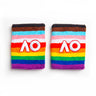 A pair of multicolored wristbands with the AO logo on them, featuring a rainbow design on a white background.